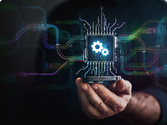 Hand holding a microchip with gears and colorful circuit lines representing data flow