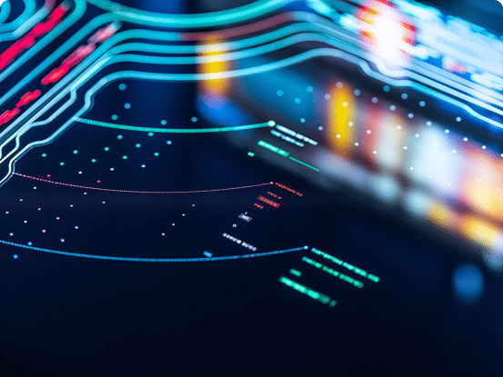 Close-up of a digital interface with colorful lines, dots, and text, resembling a futuristic data display.