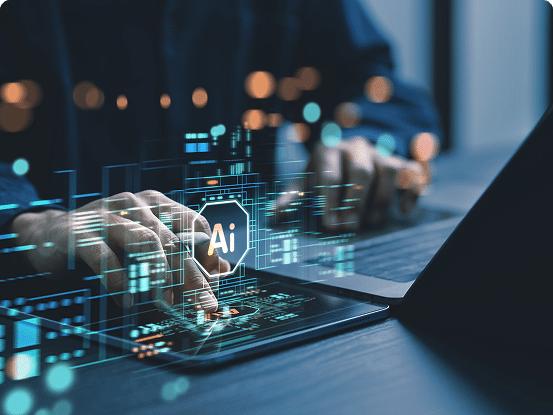 Person using a laptop with digital graphics and the text "AI" representing artificial intelligence and technology.